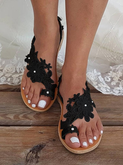 Flache Strandsandalen im Bohemian-Stil mit Blumenmuster und Flip-Toe 