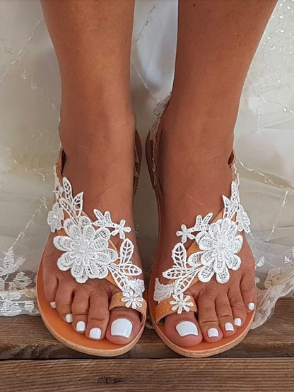 Flache Strandsandalen im Bohemian-Stil mit Blumenmuster und Flip-Toe 