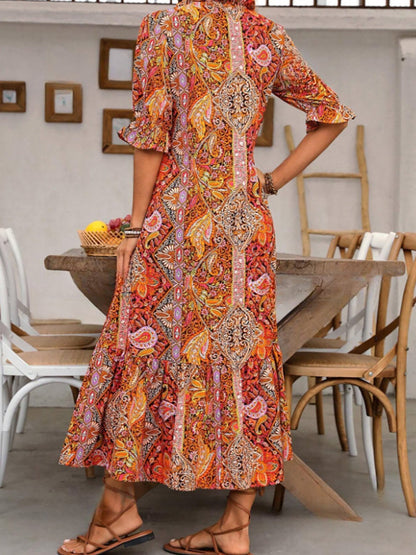 Robe tunique longue style bohème à imprimé cachemire et col noué avec pompons - Style vacances élégant avec cordon de serrage, ourlet à volants et imprimé aléatoire 